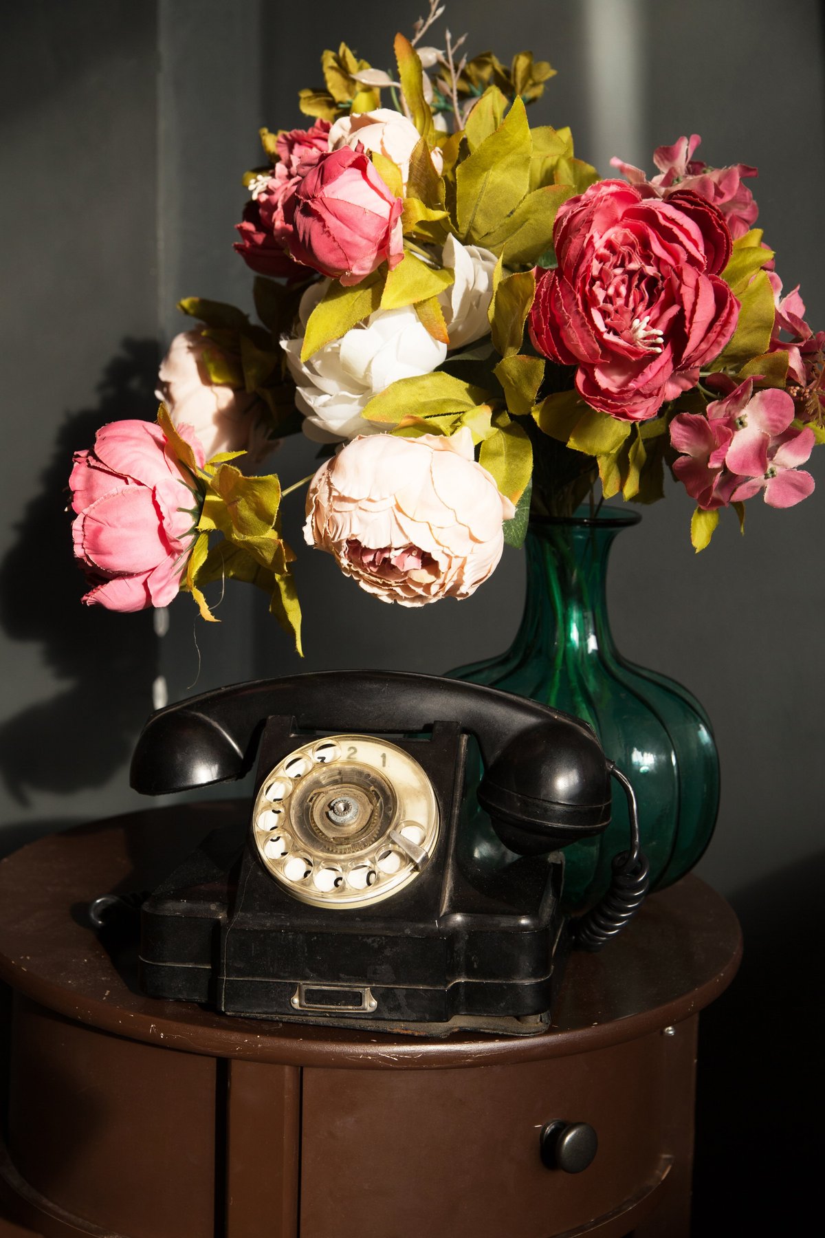 Vintage rotary phone with flowers